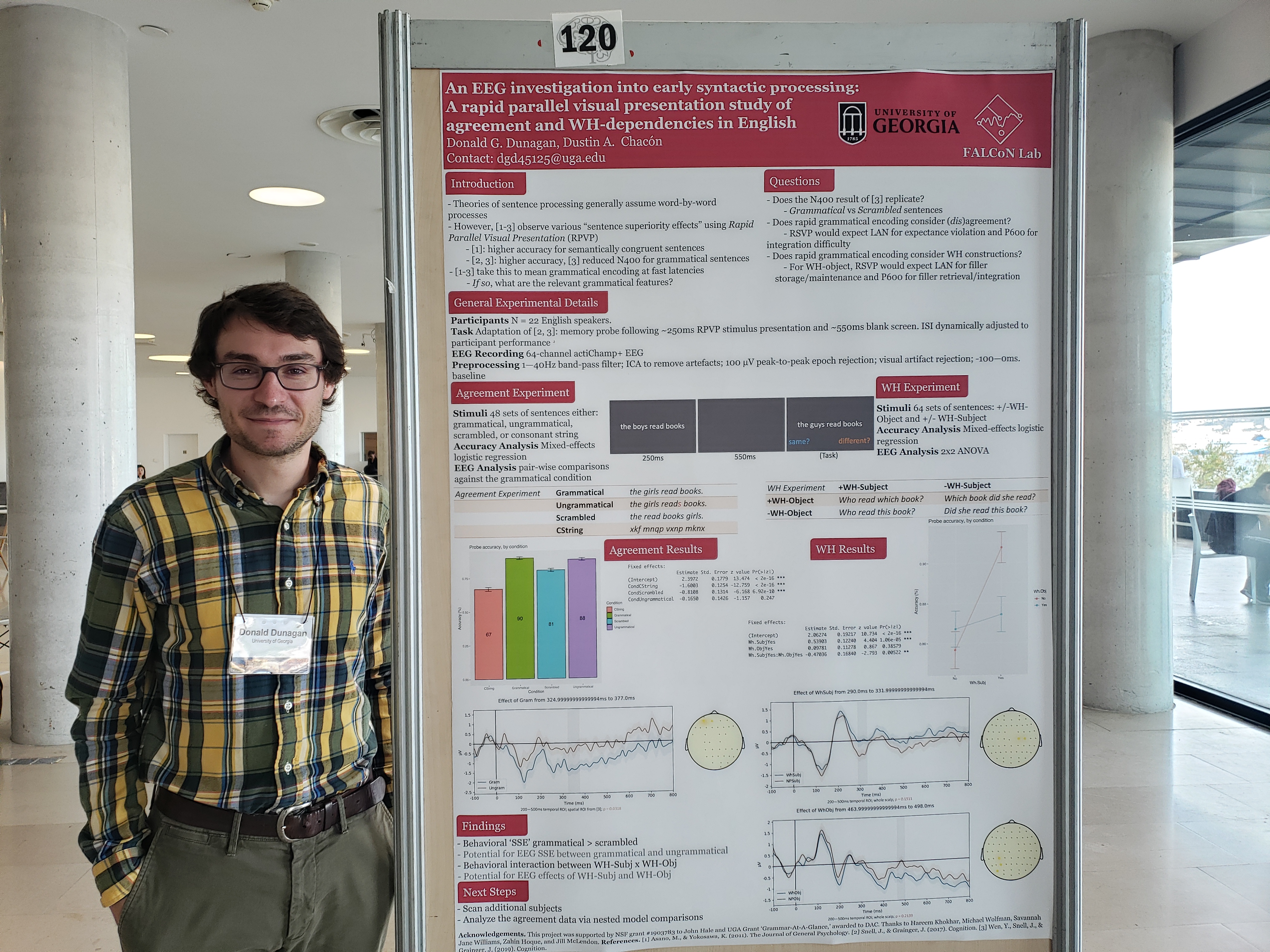 Donald Dunagan next to his research poster