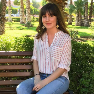 Leah Dudley sitting on bench